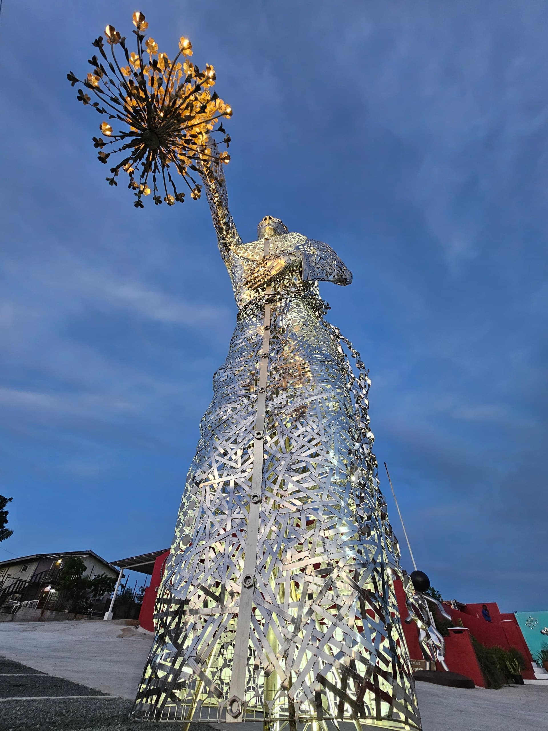 The 7.1-meter Light Bearer seen from below against the sky